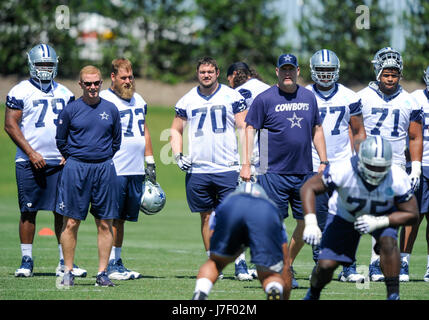 May 24, 2017: Dallas Cowboys offensive tackle Chaz Green #79, Dallas Cowboys head coach Jason Garrett, Dallas Cowboys center Travis Frederick #72, Dallas Cowboys guard Zack Martin #70, Dallas Cowboys tackle Tyron Smith #77, and guard La'el Collins #71 watch during Organized Team Activities mini camp practice at The Star in Frisco, TX Albert Pena/CSM Stock Photo