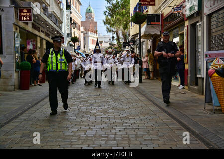 Gibraltar. 24th May 2017. Royal Gibraltar Police recruits today paraded through Main Street onto Casemates Square under tight armed security. The Police Passing Out parade continued as normal with the British Overseas Territory keeping their security levels at Substantial and not paralleling the UK’s Critical security status. The parade was supported by Armed Response Units from both the RGP and GDP along with AFO officers, police dog units and search teams to ensure tight security measures were in place throughout the event. Credit: Stephen Ignacio/Alamy Live News Stock Photo