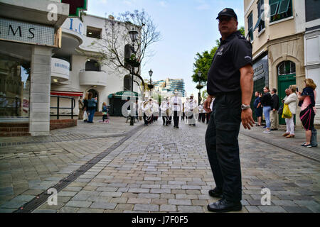 Gibraltar. 24th May 2017. Royal Gibraltar Police recruits today paraded through Main Street onto Casemates Square under tight armed security. The Police Passing Out parade continued as normal with the British Overseas Territory keeping their security levels at Substantial and not paralleling the UK’s Critical security status. The parade was supported by Armed Response Units from both the RGP and GDP along with AFO officers, police dog units and search teams to ensure tight security measures were in place throughout the event. Credit: Stephen Ignacio/Alamy Live News Stock Photo