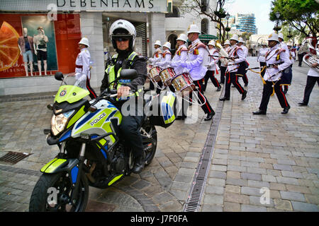 Gibraltar. 24th May 2017. Royal Gibraltar Police recruits today paraded through Main Street onto Casemates Square under tight armed security. The Police Passing Out parade continued as normal with the British Overseas Territory keeping their security levels at Substantial and not paralleling the UK’s Critical security status. The parade was supported by Armed Response Units from both the RGP and GDP along with AFO officers, police dog units and search teams to ensure tight security measures were in place throughout the event. Credit: Stephen Ignacio/Alamy Live News Stock Photo