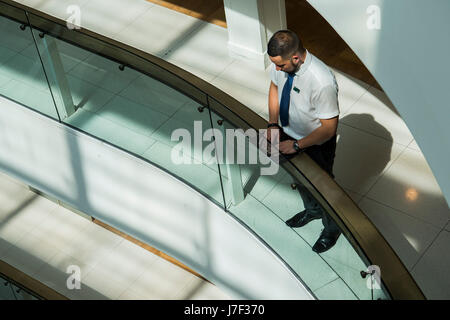 London, UK. 25th May, 2017. Staff and shoppers in Peter Jones (Sloane Square) observe a minutes silence to remember the victims of the Manchester attack. London 25 May 2017. Credit: Guy Bell/Alamy Live News Stock Photo
