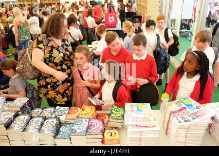 Hay Festival 2017 - Hay on Wye, Wales, UK - May 2017 - Local school children enjoy the  opening day of this years Hay Festival  The children shown here are among the 70,000 books on sale in the Festival bookshop. Over 3,000 primary school children will attend Day 1 of the literary festival that runs until June 4th. Credit: Steven May/Alamy Live News Stock Photo