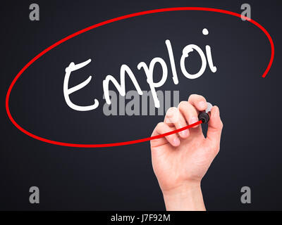 Man Hand writing Emploi (Employment in French) with black marker on visual screen. Isolated on background. Business, technology, internet concept. Sto Stock Photo