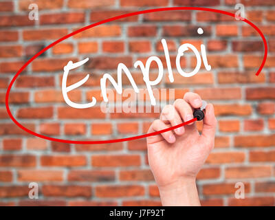 Man Hand writing Emploi (Employment in French) with black marker on visual screen. Isolated on background. Business, technology, internet concept. Sto Stock Photo