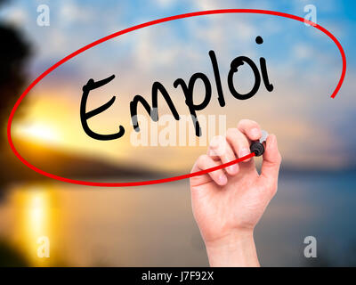 Man Hand writing Emploi (Employment in French) with black marker on visual screen. Isolated on background. Business, technology, internet concept. Sto Stock Photo