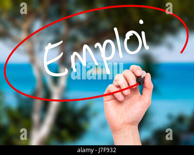 Man Hand writing Emploi (Employment in French) with black marker on visual screen. Isolated on background. Business, technology, internet concept. Sto Stock Photo