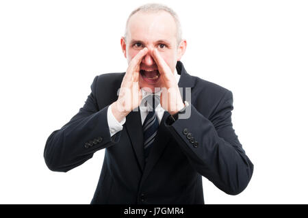 Middle aged elegant man screaming out loud wearing suit and tie isolated on white background Stock Photo
