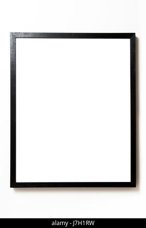 Rectangular black frame hanging on white wall Stock Photo - Alamy