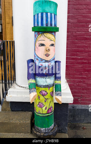 Painted manikin in front of establishment in North Hatley Quebec Canada Stock Photo