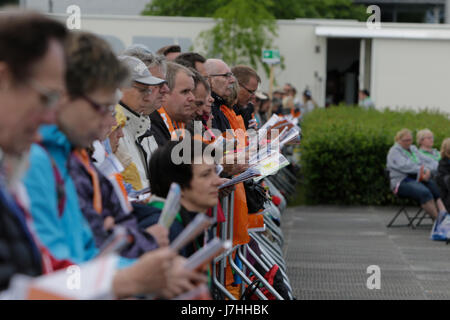 Berlin, Germany. 24th May, 2017. People sing during the opening service. Tens of thousands of people attended the opening services of the 36th German Protestant Church Congress (Evangelischer Kirchentag). The Congress is held from 24. to 28. May in Berlin and more than 100,000 visitors are expected to attend. The congress coincides with the 500. anniversary of the Reformation. Credit: Michael Debets/Pacific Press/Alamy Live News Stock Photo