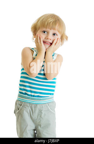 Surprised little boy with hands on cheeks over white background Stock Photo