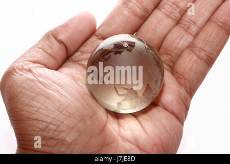 Transparant Earth in hand Stock Photo