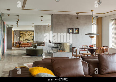 Informal seating and dining area in 30 meter living space Stock Photo