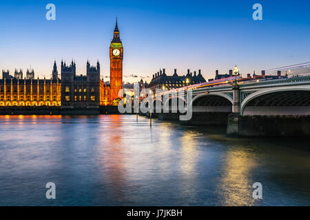 Big Ben, Queen Elizabeth Tower and Westminster Bridge Illuminated in the Evening, London, United Kingdom Stock Photo