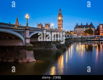 Big Ben, Queen Elizabeth Tower and Westminster Bridge Illuminated in the Morning, London, United Kingdom Stock Photo