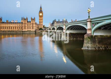 Big Ben, Queen Elizabeth Tower and Westminster Bridge Illuminated in the Morning, London, United Kingdom Stock Photo
