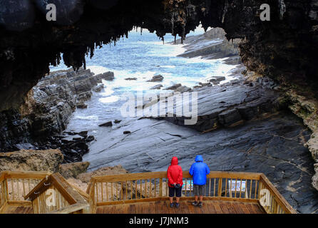 Tourists visit the cave of Admirals Arch on Kangaroo Island, South Australia. Stock Photo