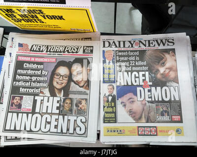 New York tabloid newspapers continue to report on the deaths in Monday's bombing in Manchester UK on Wednesday, May 24, 2017 during a terrorist attack after an Ariana Grande concert in the Manchester Arena. (© Richard B. Levine) Stock Photo