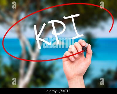 Man Hand writing KPI (Key Performance Indicator) with black marker on ...