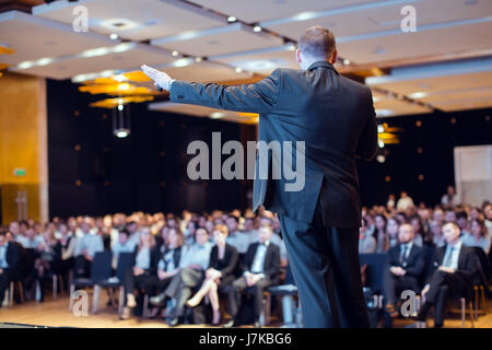Speaker giving talk at business conference event Stock Photo