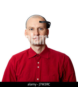 Portrait of young man with EEG (electroencephalography) headset on head. Isolated on white background. Stock Photo