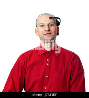 Portrait of young man in red shirt with EEG (electroencephalography) headset on head. Isolated on white background. Stock Photo