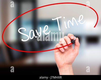 Man Hand writing Save Time with black marker on visual screen. Isolated on office. Business, technology, internet concept. Stock Photo Stock Photo