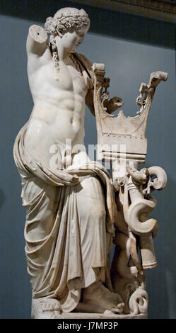 Statue of the ancient Greek god Apollo on the pediment above the famous ...