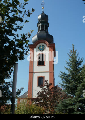 This photograph taken on September 26, 2011, shows St. Pankratius in Schwetzingen, Germany. The church is known for its Baroque architectural style and is an important historical landmark in the region. Stock Photo