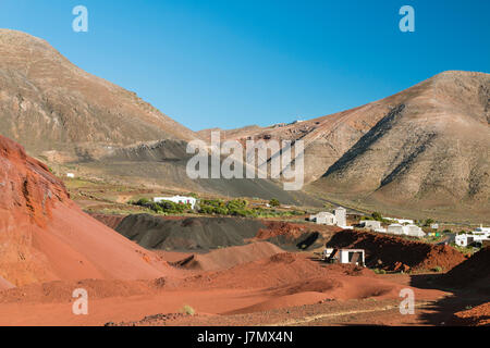 View from the Caldera de Masian in Lanzarote, Spain to the village of Femes. Stock Photo