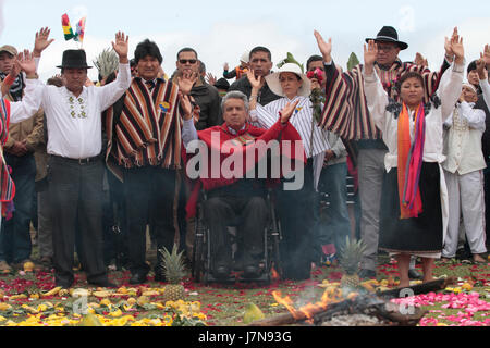 President of Ecuador, Lenin Moreno receives the ceremonial staff of indigenous leaders in the archaeological park of Cochasquí, an area considered sacred in Ecuador, in Cochasquí, Thursday, May 25, 2017. Credit: Franklin Jácome/Alamy Live News Stock Photo