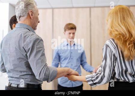 Handsome elderly man standing in the circle Stock Photo