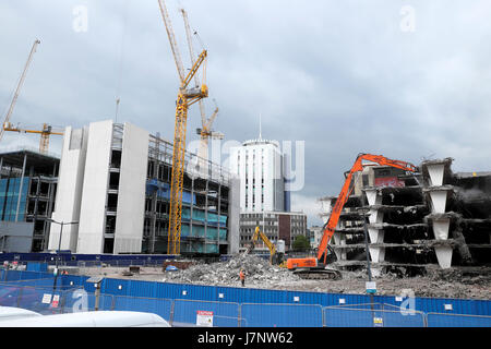 Demolition of derelict buildings on construction site at Wood Street carpark near station Central Square, Cardiff City Centre, Wales UK  KATHY DEWITT Stock Photo