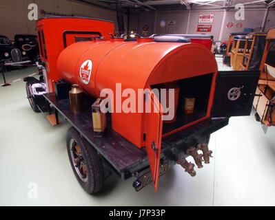 This 1919 Ford TT Tankwagen is a historical vehicle that played a key role in the development of transportation for the oil and fuel industry. It represents early 20th-century industrial design and automotive history. Stock Photo