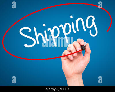 Man Hand writing Shipping with black marker on visual screen. Isolated on background. Business, technology, internet concept. Stock Photo Stock Photo