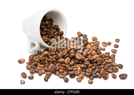 overturned coffee cup with bunch of coffee beans, on white background Stock Photo
