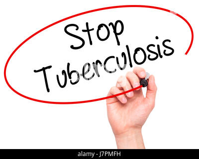 Man Hand writing Stop Tuberculosis with black marker on visual screen. Isolated on background. Business, technology, internet concept. Stock Photo Stock Photo