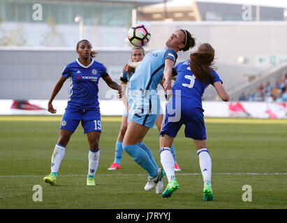 Manchester City Women's Lucy Bronze (centre) battles for the ball with Chelsea Ladies' Crystal Dunn (left) and Hannah Blundell during the FA Women's Super League Spring Series match at the Academy Stadium, Manchester. Stock Photo