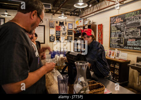 People waiting to pay the cashier at Pecan Lodge, Deep Ellum, Dallas, Texas Stock Photo