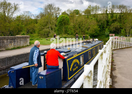 A narrowboat navigates Avoncliff Aqueduct on the Kennet and Avon Canal between Bradford and Avon and Bath in Wiltshire, England.