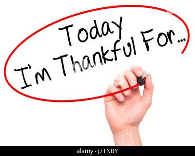 Man Hand writing Today I'm Thankful For... with black marker on visual screen. Isolated on white. Life, technology, internet concept. Stock Image Stock Photo