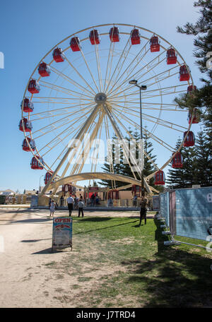 Fremantle,WA,Australia-November 13,2016: People at Esplanade Park with ferris wheel under a clear blue sky in Fremantle, Western Australia. Stock Photo