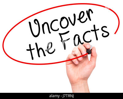 Man Hand writing Uncover the Facts with black marker on visual screen ...