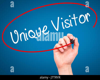 Man Hand writing Unique Visitor with black marker on visual screen. Isolated on background. Business, technology, internet concept. Stock Photo Stock Photo