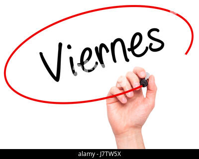 Man Hand writing Viernes (Friday in Spanish) with black marker on visual screen. Isolated on white. Business, technology, internet concept. Stock Phot Stock Photo