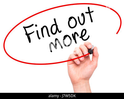 Man Hand writing Find out more with marker on transparent wipe board. Isolated on white. Business, internet, technology concept.  Stock Photo Stock Photo