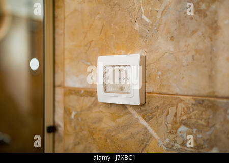 The socket in the bathroom with waterproof. Electrical Engineeri Stock Photo