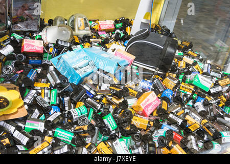 a bunch of old photographic films in a shop window Stock Photo