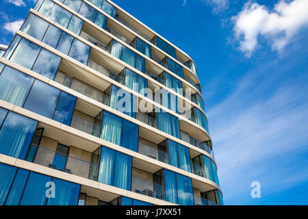 Modern residential apartment building with balconies (Cheval Three Quays Hotel, London, UK) Stock Photo