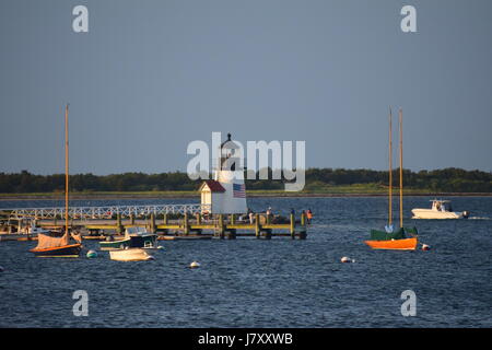 Harbor and Lighthouse in Nantucket, MA Stock Photo